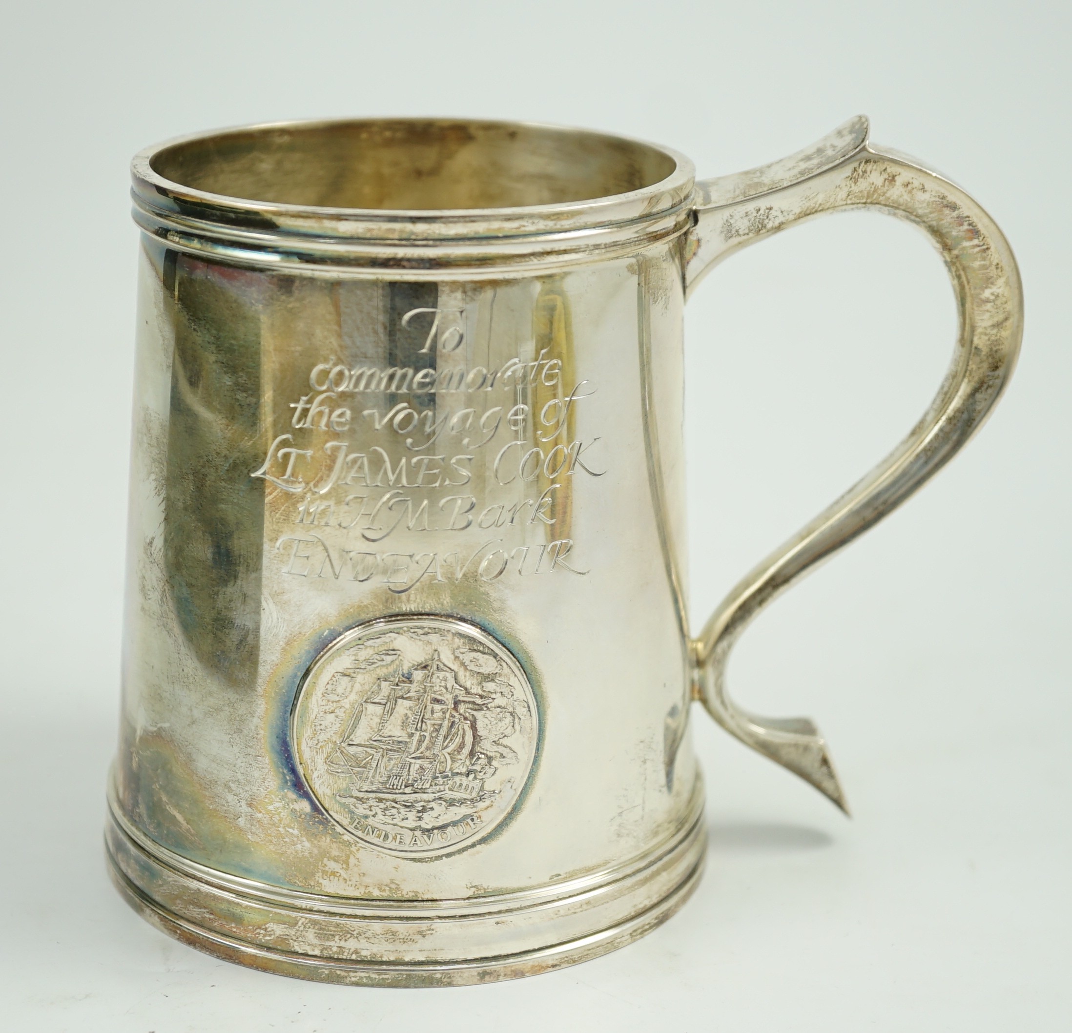 A cased Elizabeth II silver limited edition mug, engraved to commemorate the voyage of Lt. James Cook, in H.M. Bark Endeavour, to Australia
